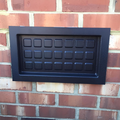 Crawl space flood vent from Shopawalla installed on a brick foundation, ensuring FEMA, NFIP, and ICC compliance for home safety.